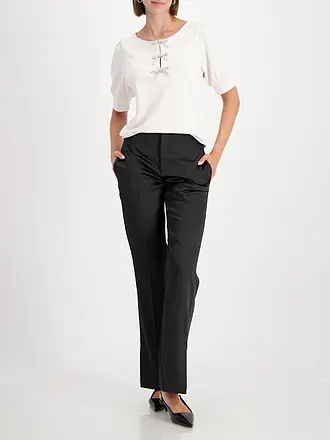 MONARI | Nombre del producto: Camiseta
Marca: MONARI
Color: beige
Categorías: Moda, Mujer
Largo de manga: Manga corta
Escote: Cuello redondo
Material: Jersey, Viscosa, Elástico
Estampado: Liso
Corte (Prenda superior): Regular
Estilo: Glamour
Detalles: Estrás |